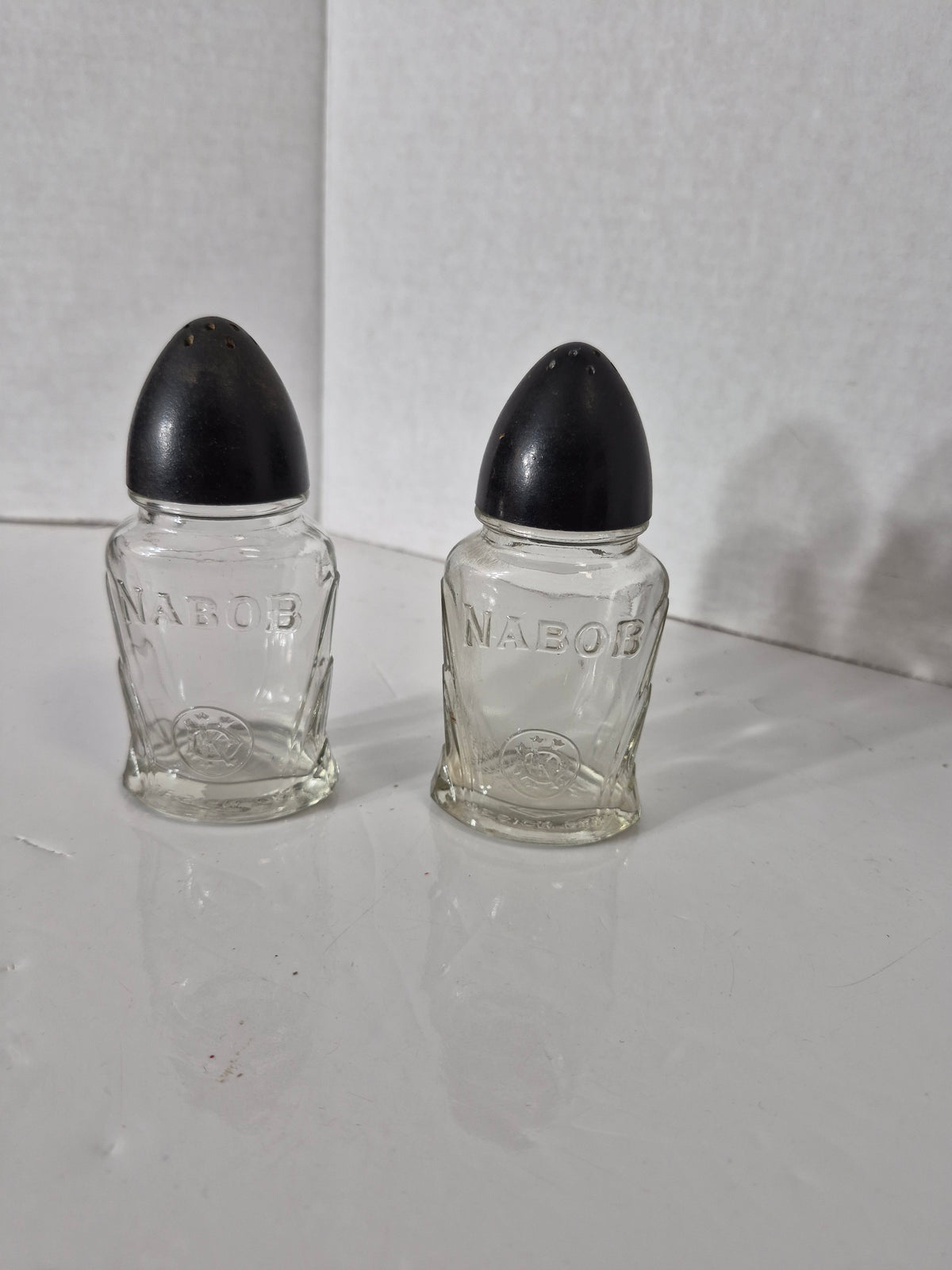 Vintage NABOB Glass Salt & Pepper Shakers – Black Bakelite-Style Tops – 4.5"