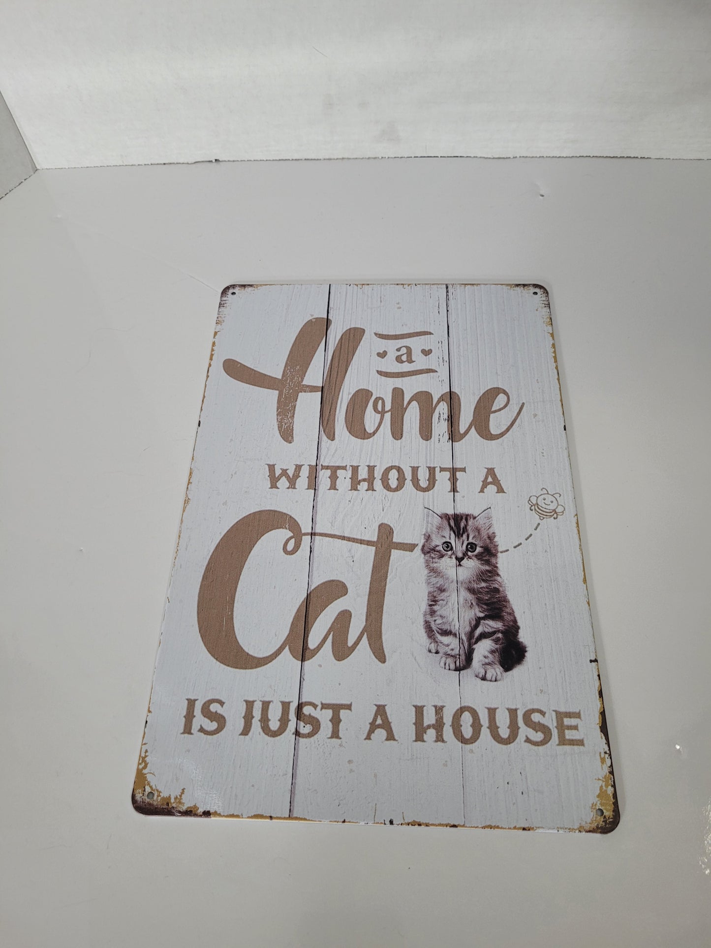 “A Home Without a Cat Is Just a House” Metal Wall Sign – 8" × 12"