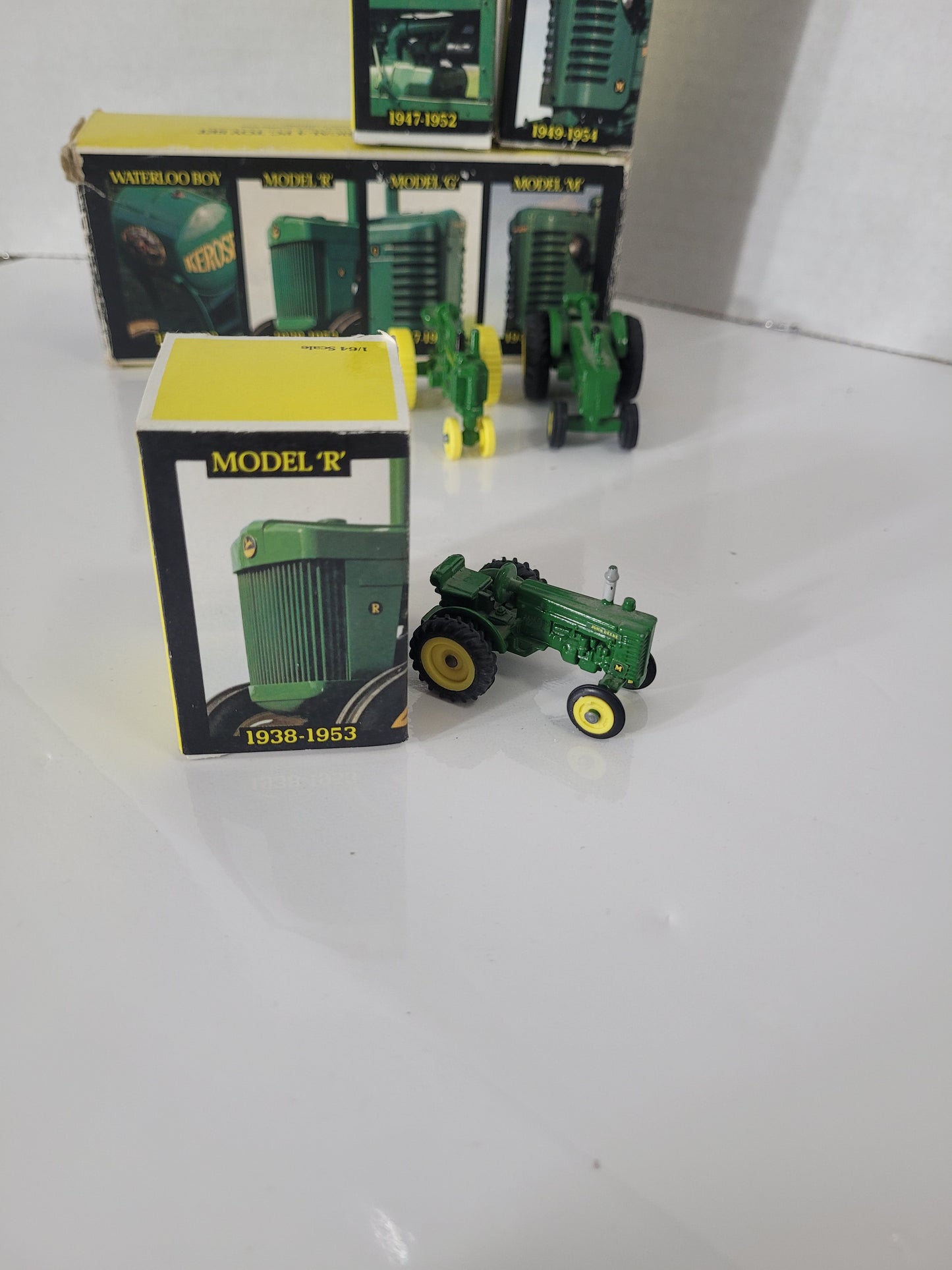 Vintage 1988 ERTL John Deere Historical 4-Piece Tractor Set – 1:64 Scale