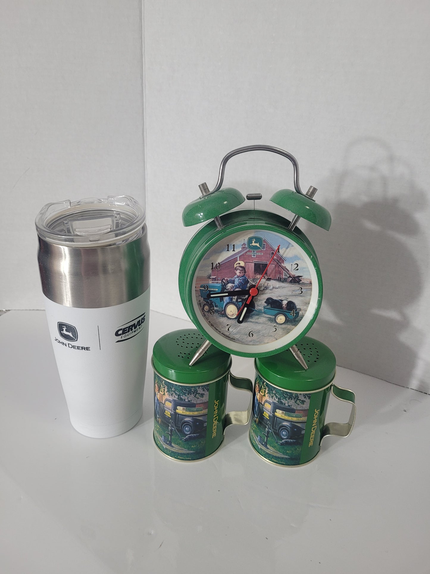 John Deere Collectible Lot – Twin Bell Clock, Salt & Pepper Shakers & Cervus Tumbler