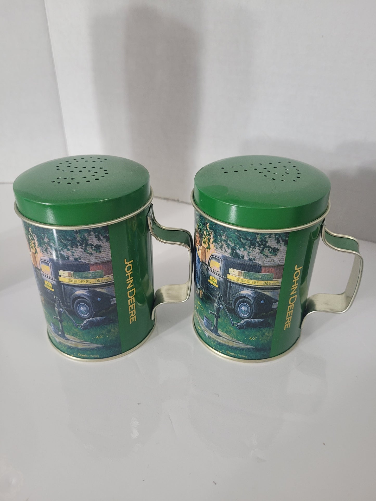 John Deere Collectible Lot – Twin Bell Clock, Salt & Pepper Shakers & Cervus Tumbler