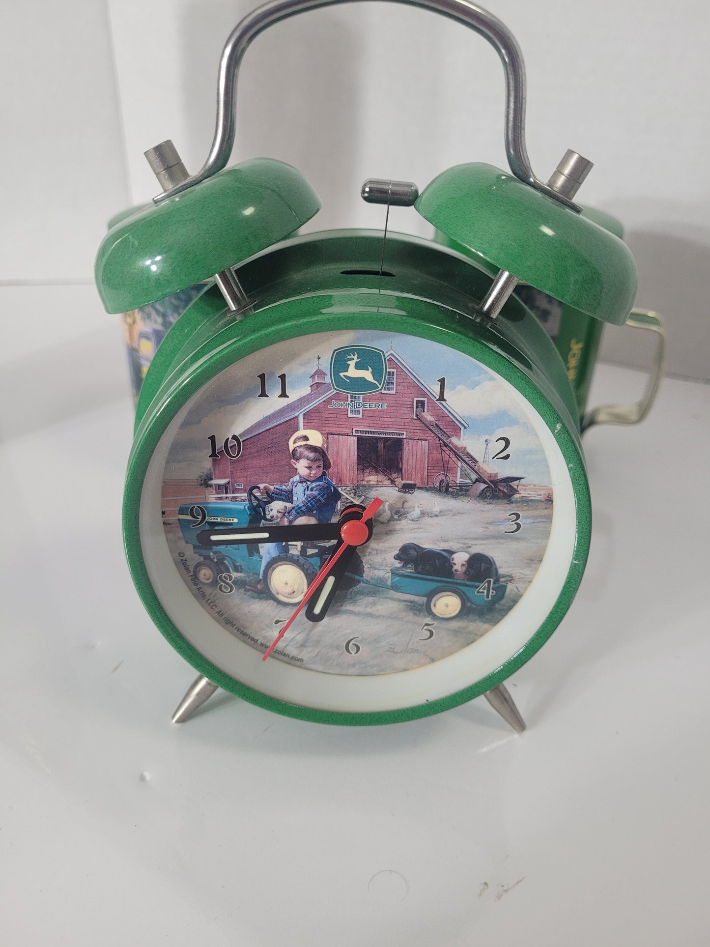 John Deere Collectible Lot – Twin Bell Clock, Salt & Pepper Shakers & Cervus Tumbler
