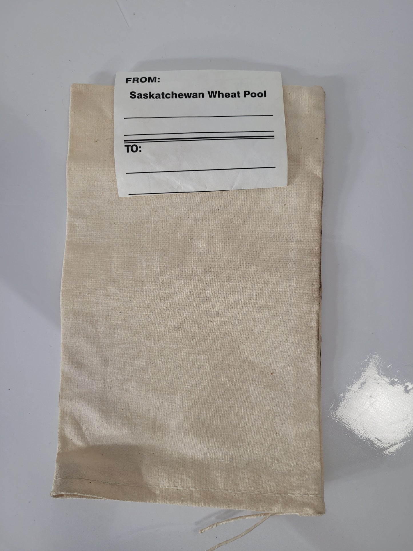 Vintage Saskatchewan Wheat Pool Grain Sample Bag with Original Tag – 6" × 10"