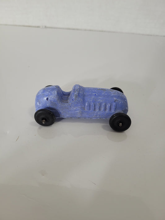 Vintage Blue Chalkware Race Car Toy with Black Wheels – 3" x 1.5"