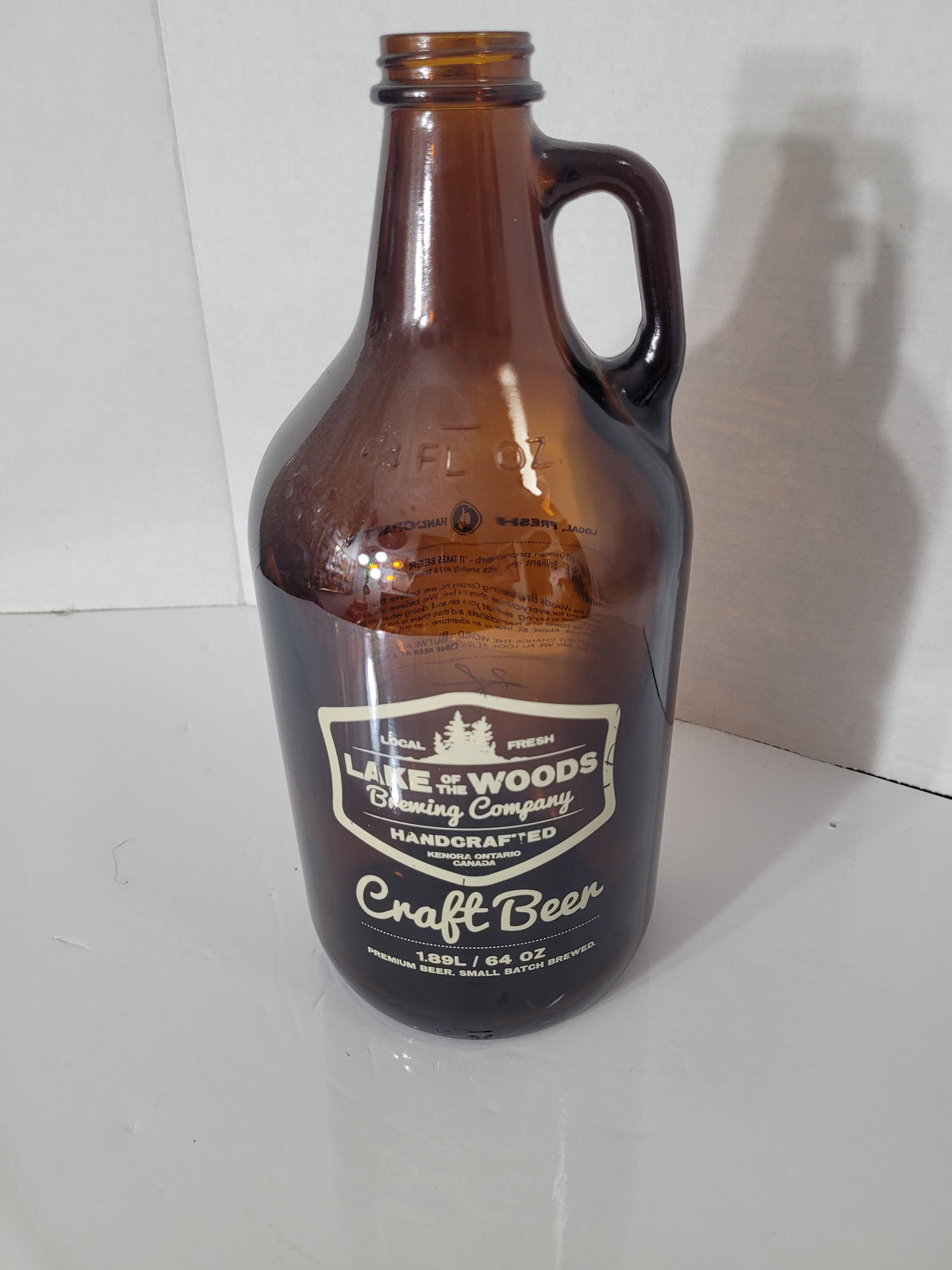 Lake of the Woods Brewing Company Amber Glass Craft Beer Growler – Kenora, Ontario