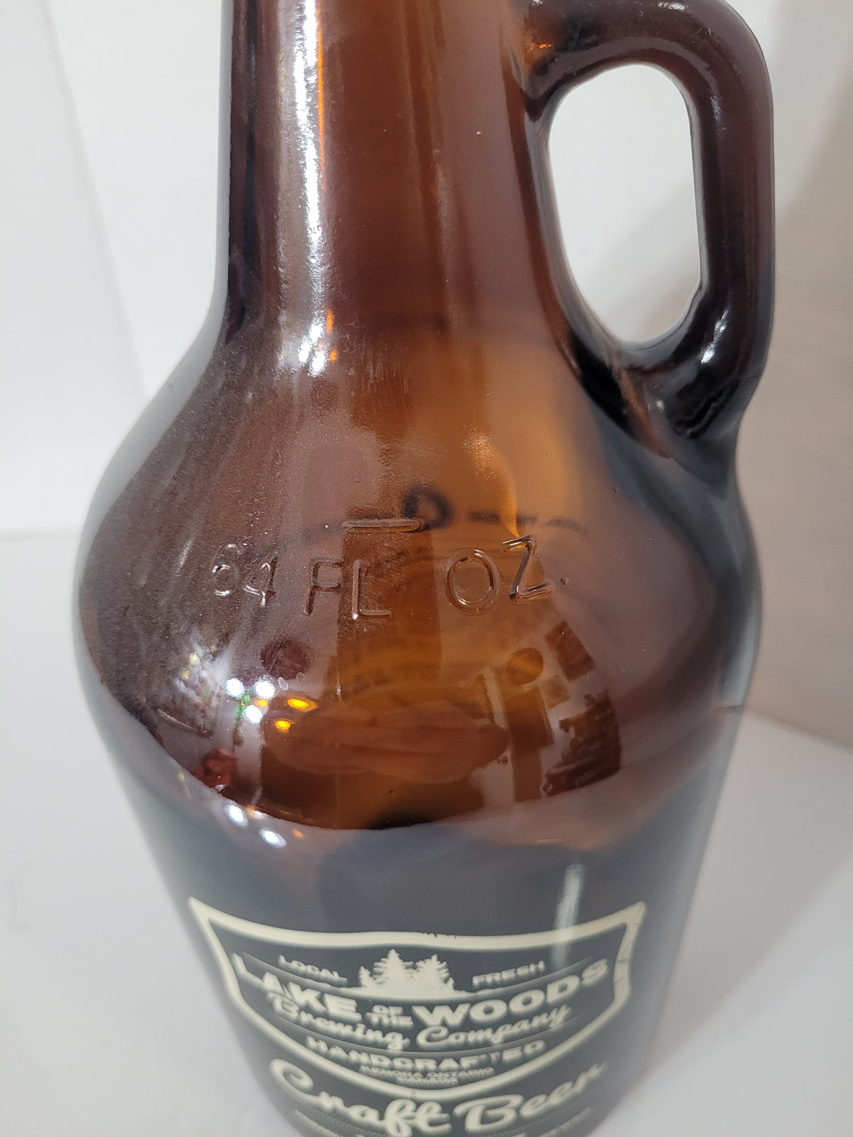 Lake of the Woods Brewing Company Amber Glass Craft Beer Growler – Kenora, Ontario