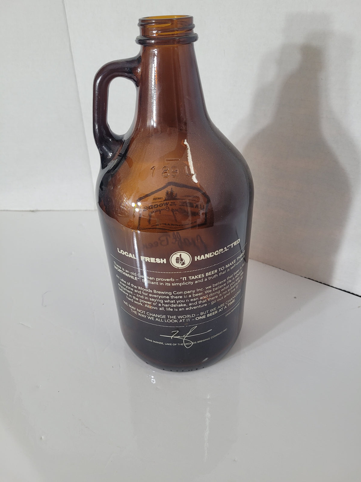 Lake of the Woods Brewing Company Amber Glass Craft Beer Growler – Kenora, Ontario
