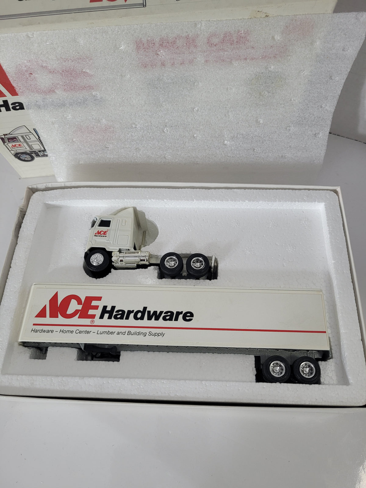 Vintage ERTL ACE Hardware Mack Cab & Trailer – 1:64 Scale – Original Box