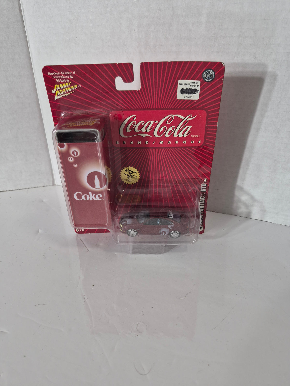 Johnny Lightning Coca-Cola 2004 Pontiac GTO with Bonus Collector Tin – Sealed