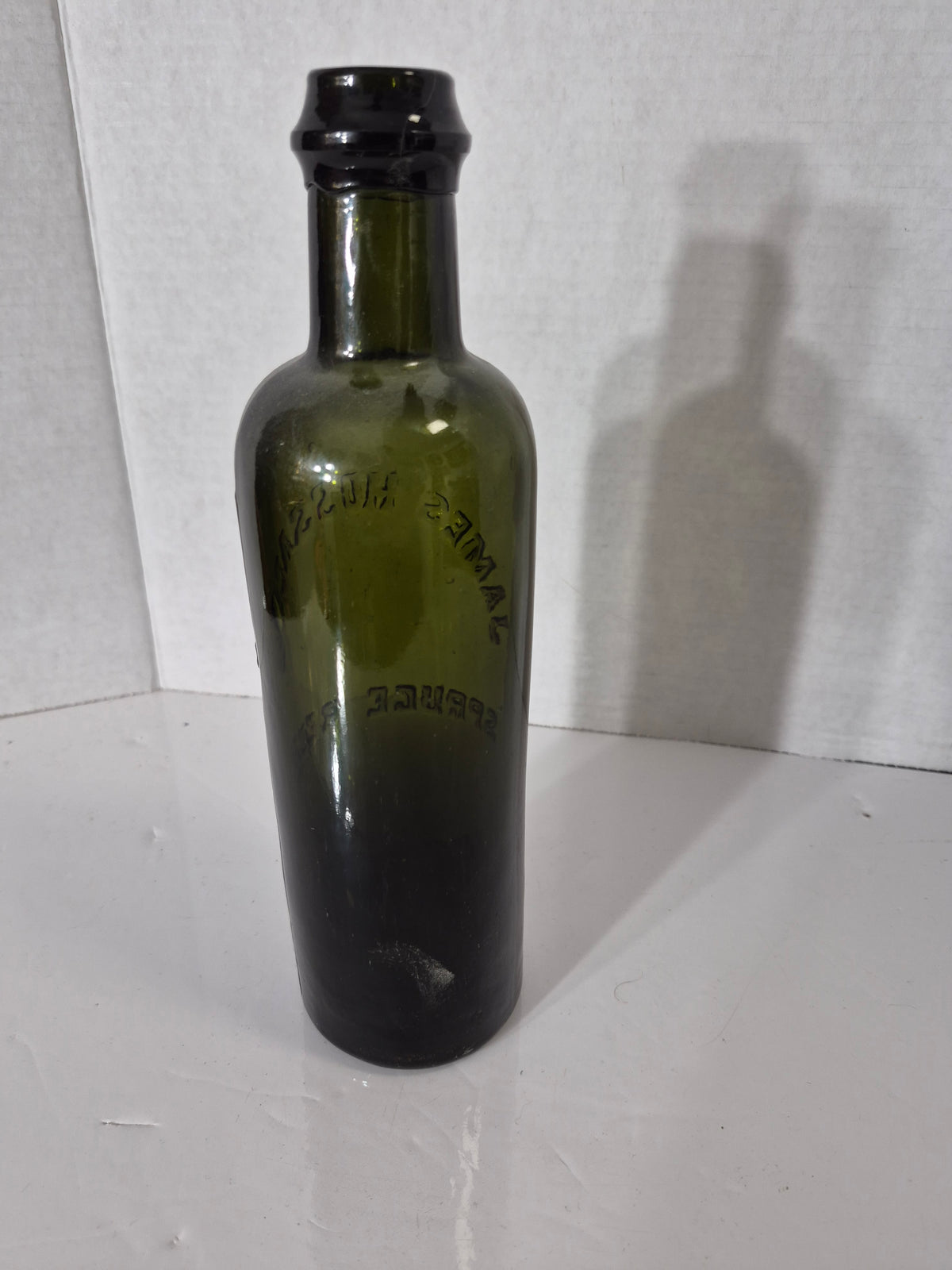 Antique James Hussey’s Spruce Beer Bottle – Olive Green Embossed Glass – Quebec