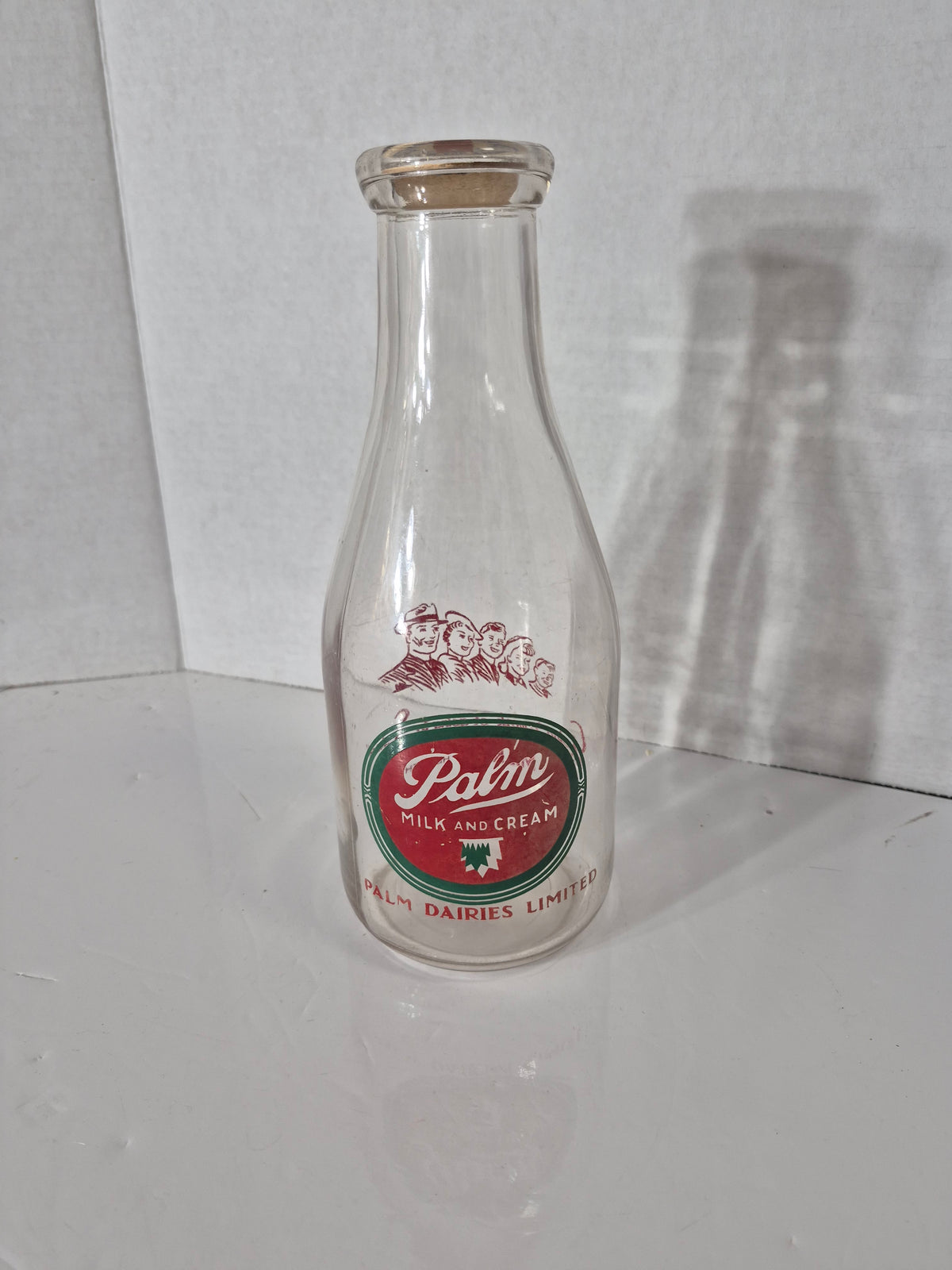 Vintage Palm Dairies Limited Quart Milk Bottle with Original Paper Cap – Saskatchewan – c. 1940s–60s
