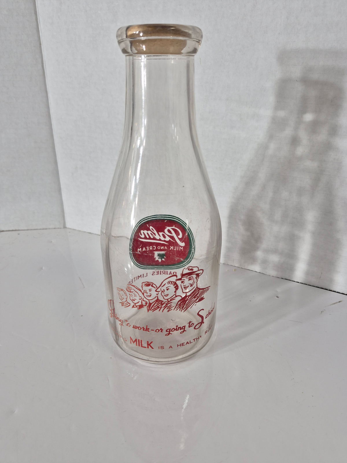 Vintage Palm Dairies Limited Quart Milk Bottle with Original Paper Cap – Saskatchewan – c. 1940s–60s