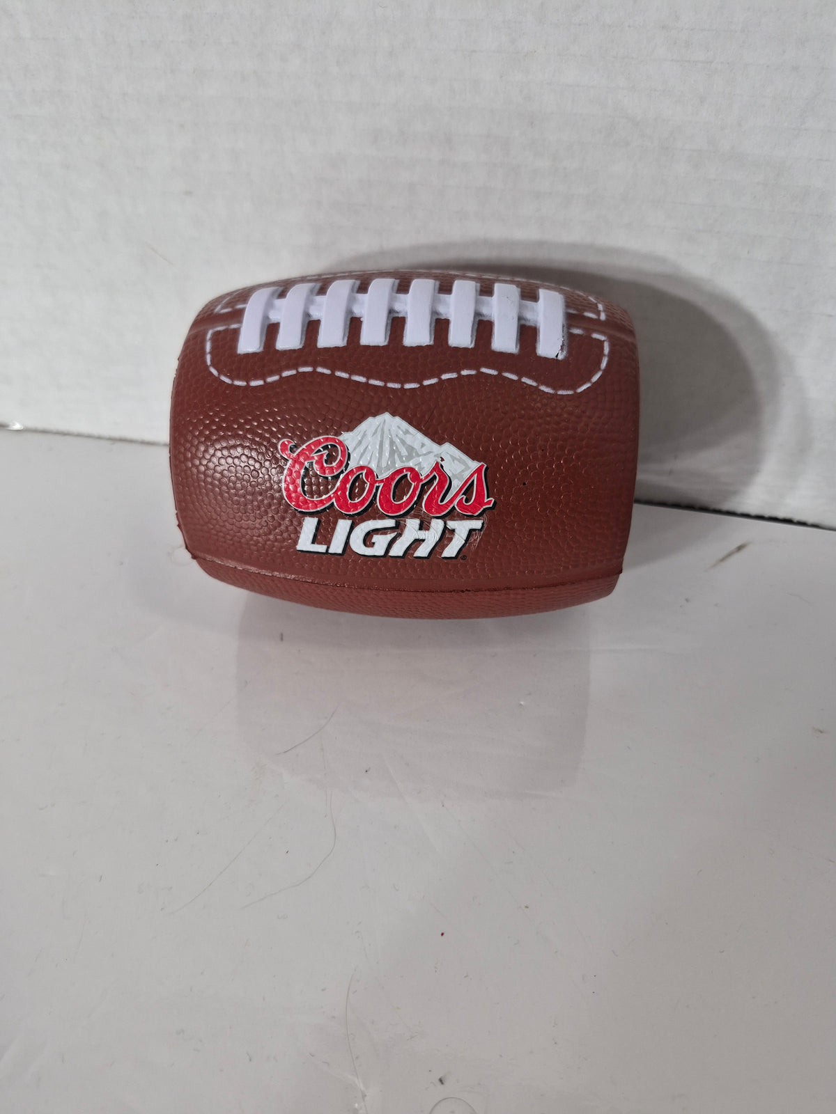 Coors Light Football-Shaped Can Cooler / Koozie – 4.5" × 3.25"