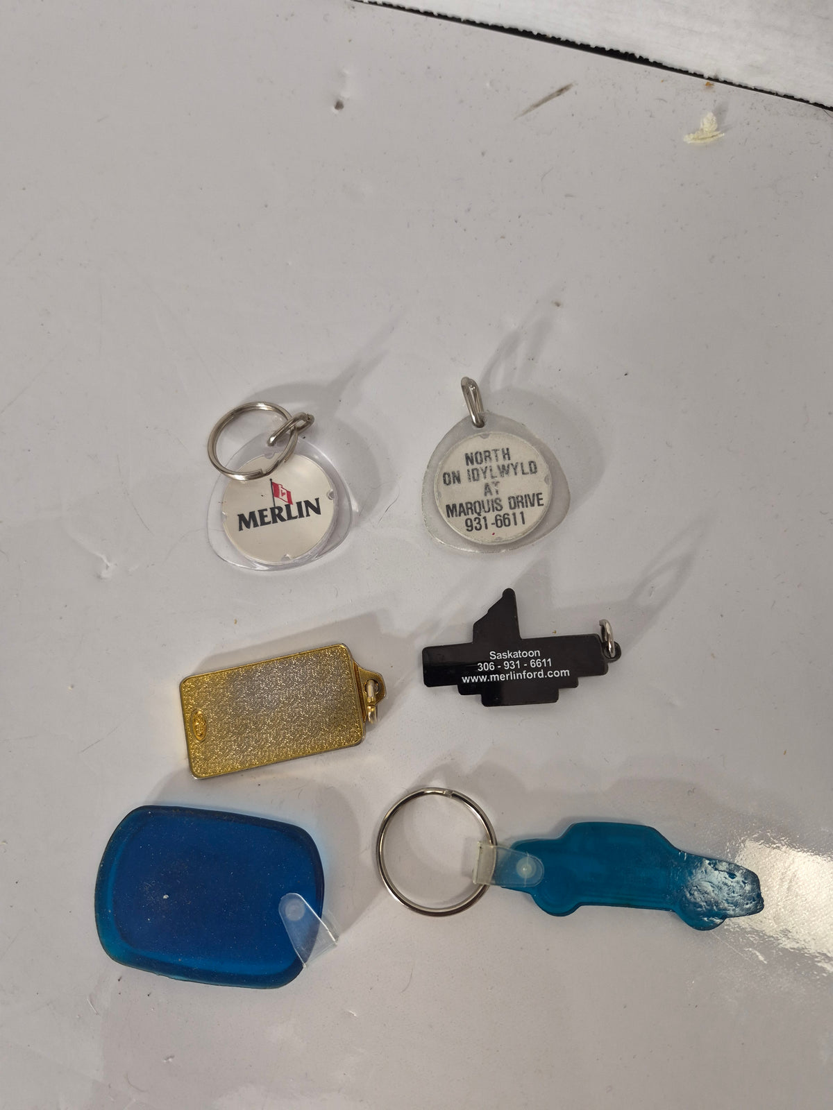 Vintage Saskatoon Car Dealership Keychain Lot of 6 – Merlin Ford, Jubilee Ford, SMP Chevrolet & SGI Canada