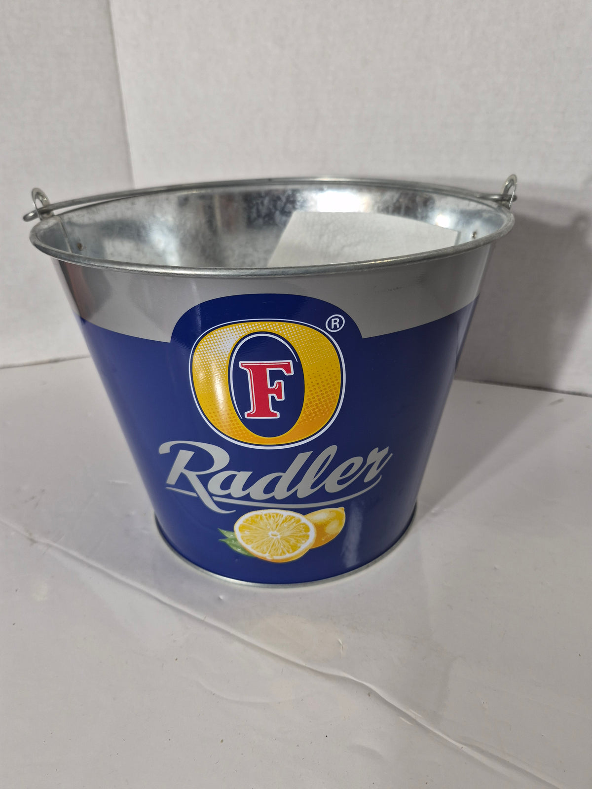 Foster's Radler Metal Bottle Bucket – Blue with Lemon Graphics – 7.25 x 9 in.