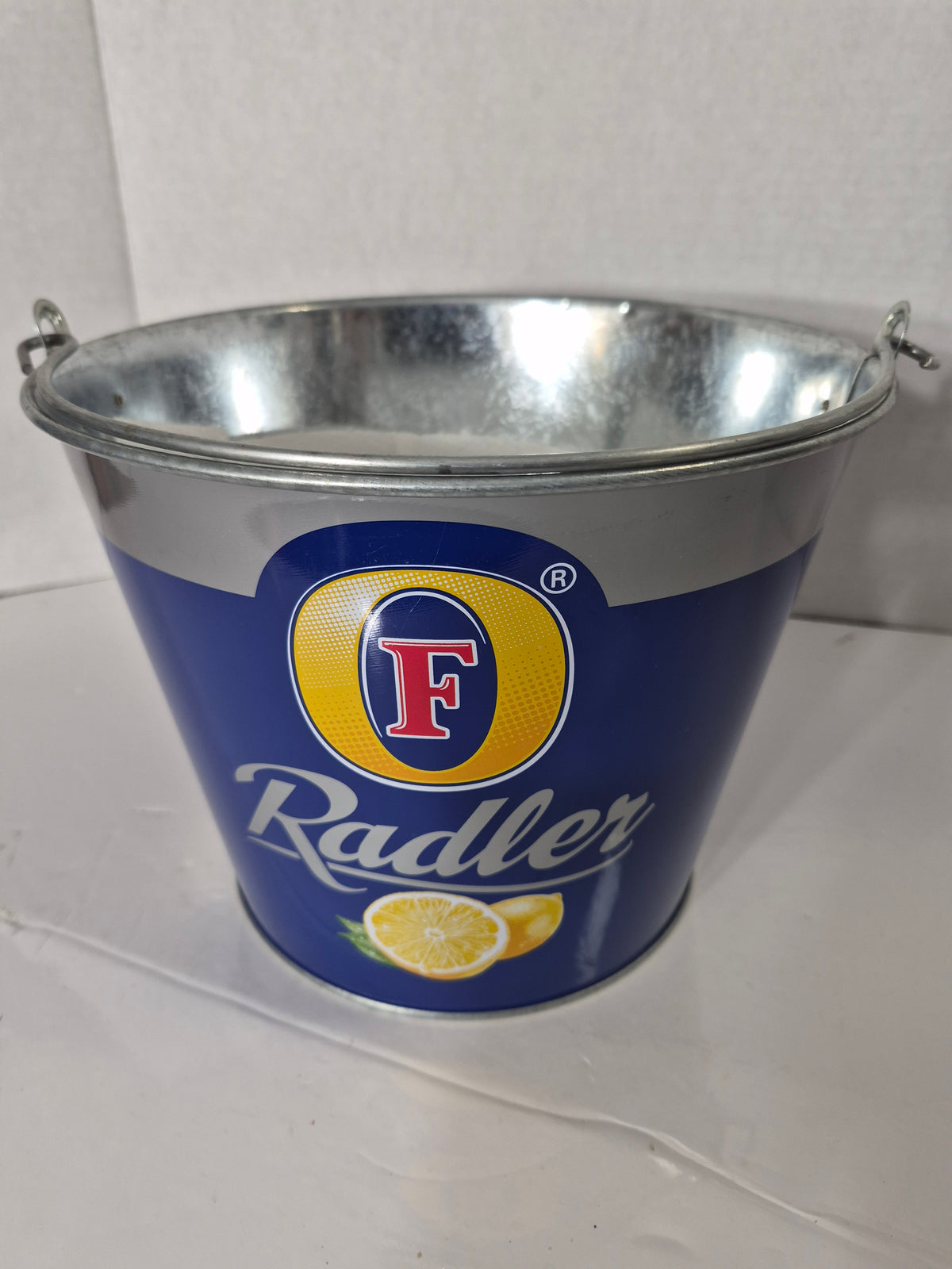 Foster's Radler Metal Bottle Bucket – Blue with Lemon Graphics – 7.25 x 9 in.