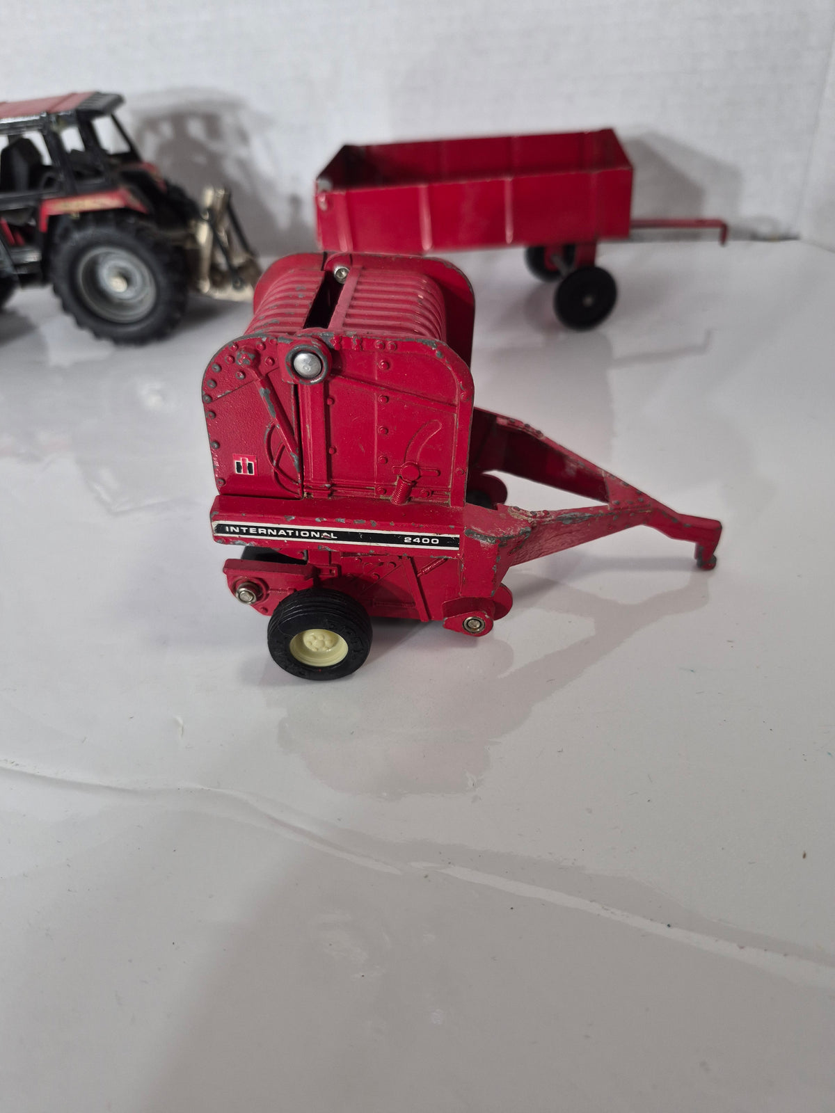 Vintage Ertl International Farm Toy Lot – Case 2294 Tractor, 2400 Baler, Auger and Wagon – 1/32