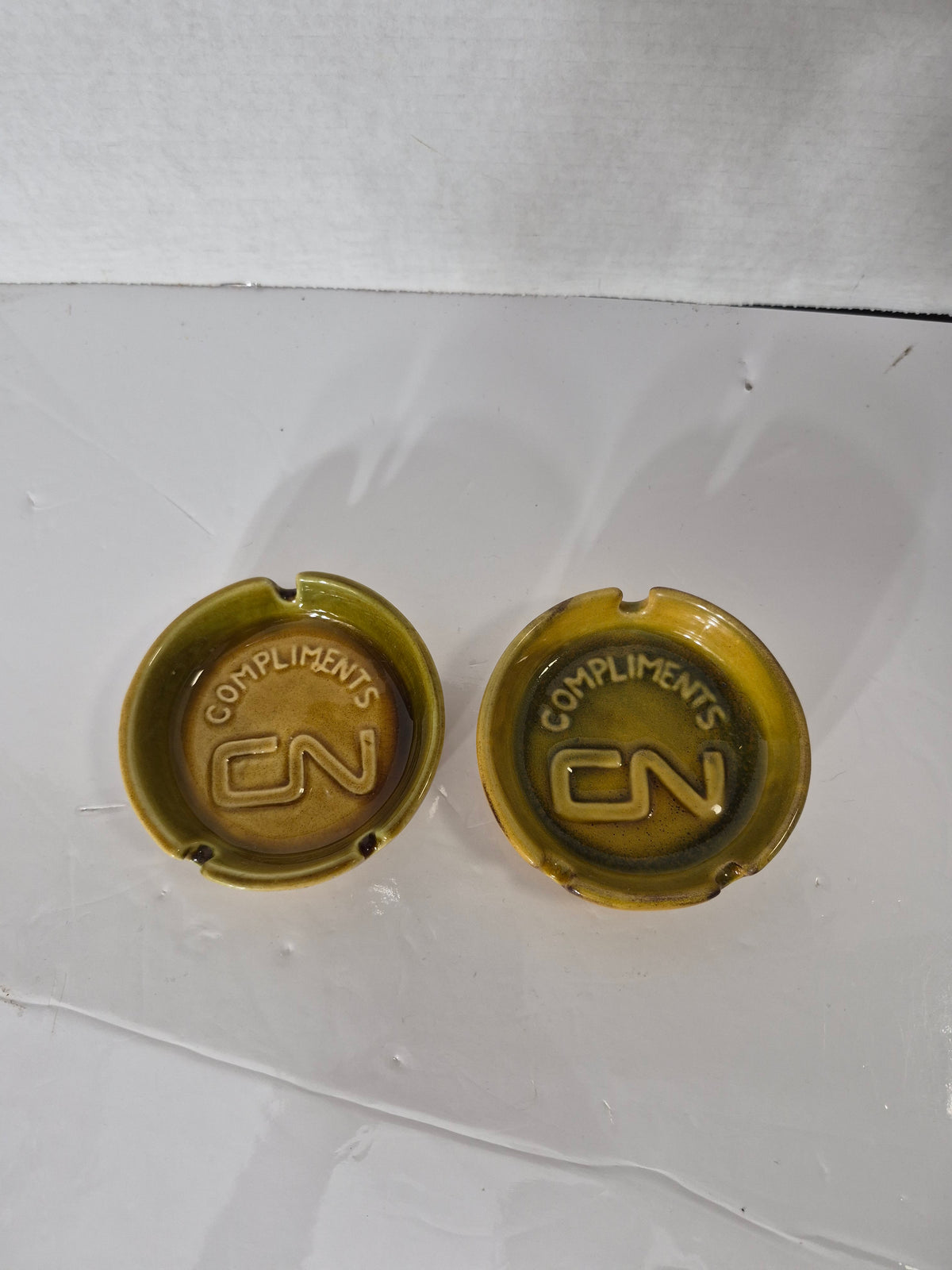 Pair of CN "Compliments" Railway Ashtrays – Brown Glazed Ceramic – 4.25 in.
