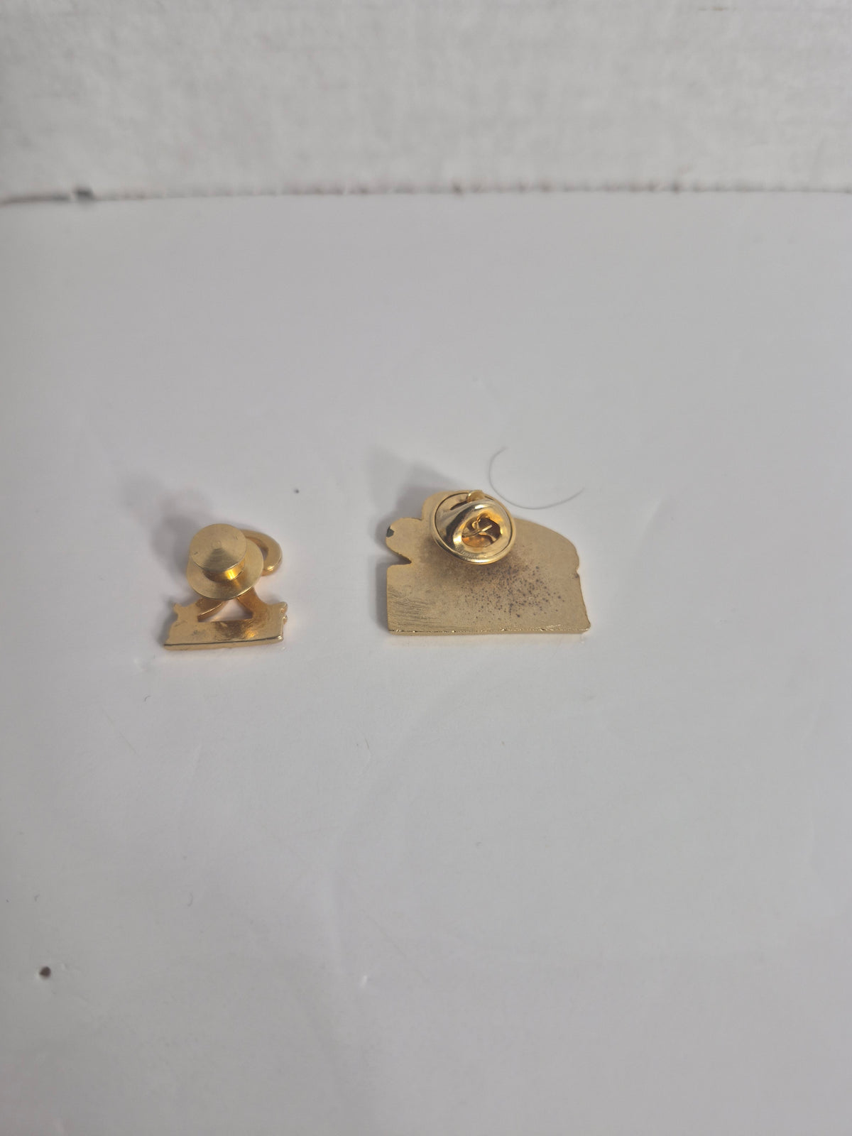 Alberta Distillers '92 Calgary Stampede Pin + Rainier Beer Pin — 2-Pin Breweriana Set