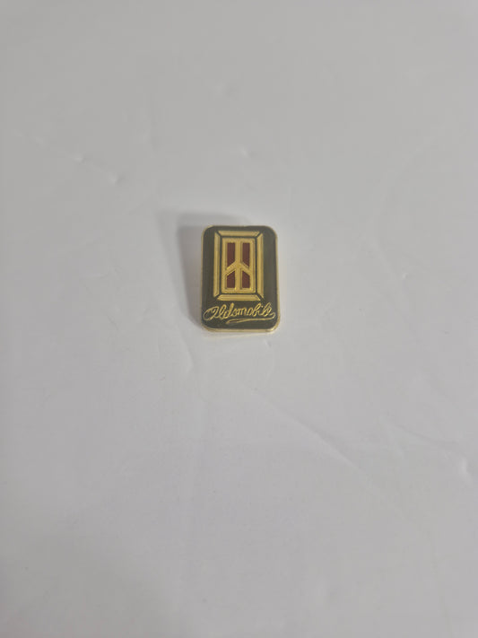 Vintage Oldsmobile Enamel Lapel Pin — Black, Red and Gold Rocket Emblem, GM Automobilia, 0.6" x 0.75"