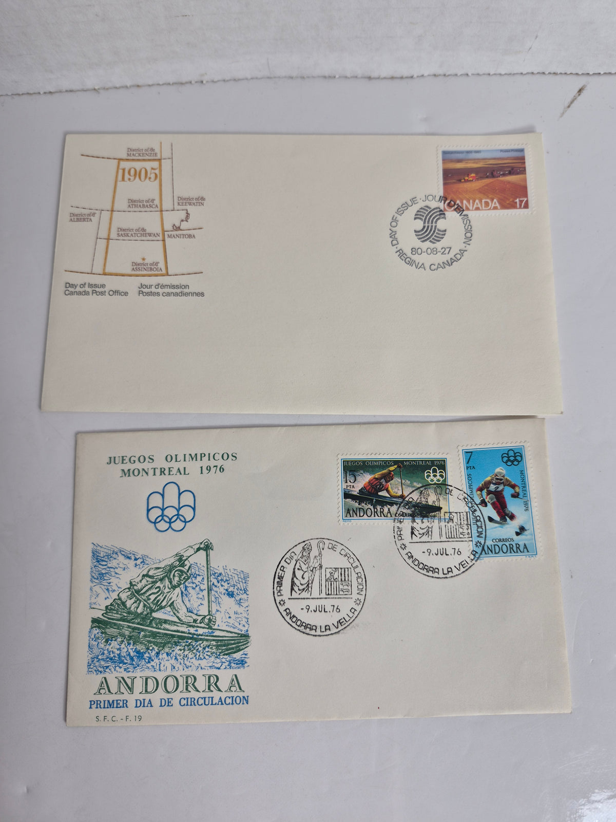 First Day Cover Pair – 1980 Saskatchewan 75th Anniversary (Regina Cancel) + 1976 Andorra FDC for the Montreal Olympics