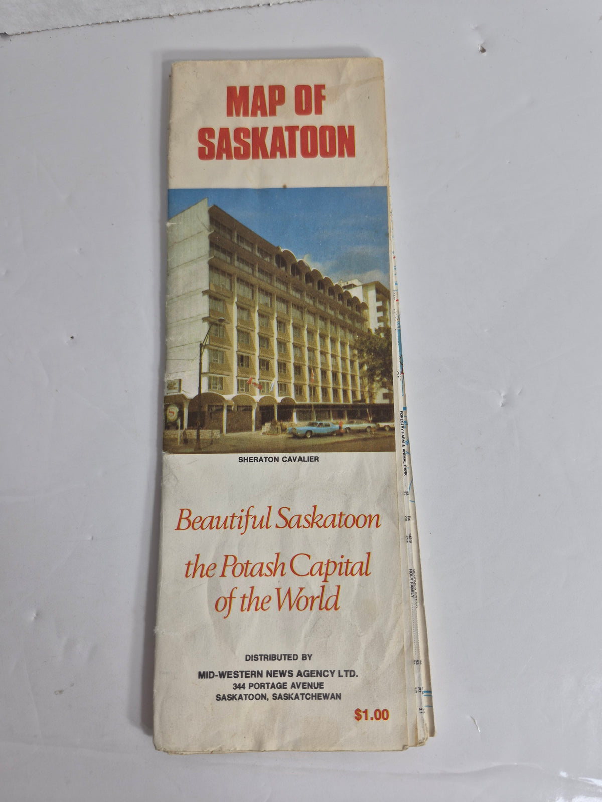 Vintage Map of Saskatoon – "Beautiful Saskatoon, the Potash Capital of the World" – Sheraton Cavalier Cover – City of Saskatoon Parks, Transit System & Schools Map with Full Street Index