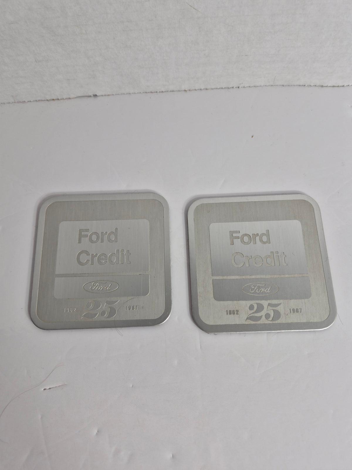 Ford Credit 25th Anniversary Metal Coasters – Pair of 2 – 1962–1987 – Etched Aluminum – Ford Memorabilia