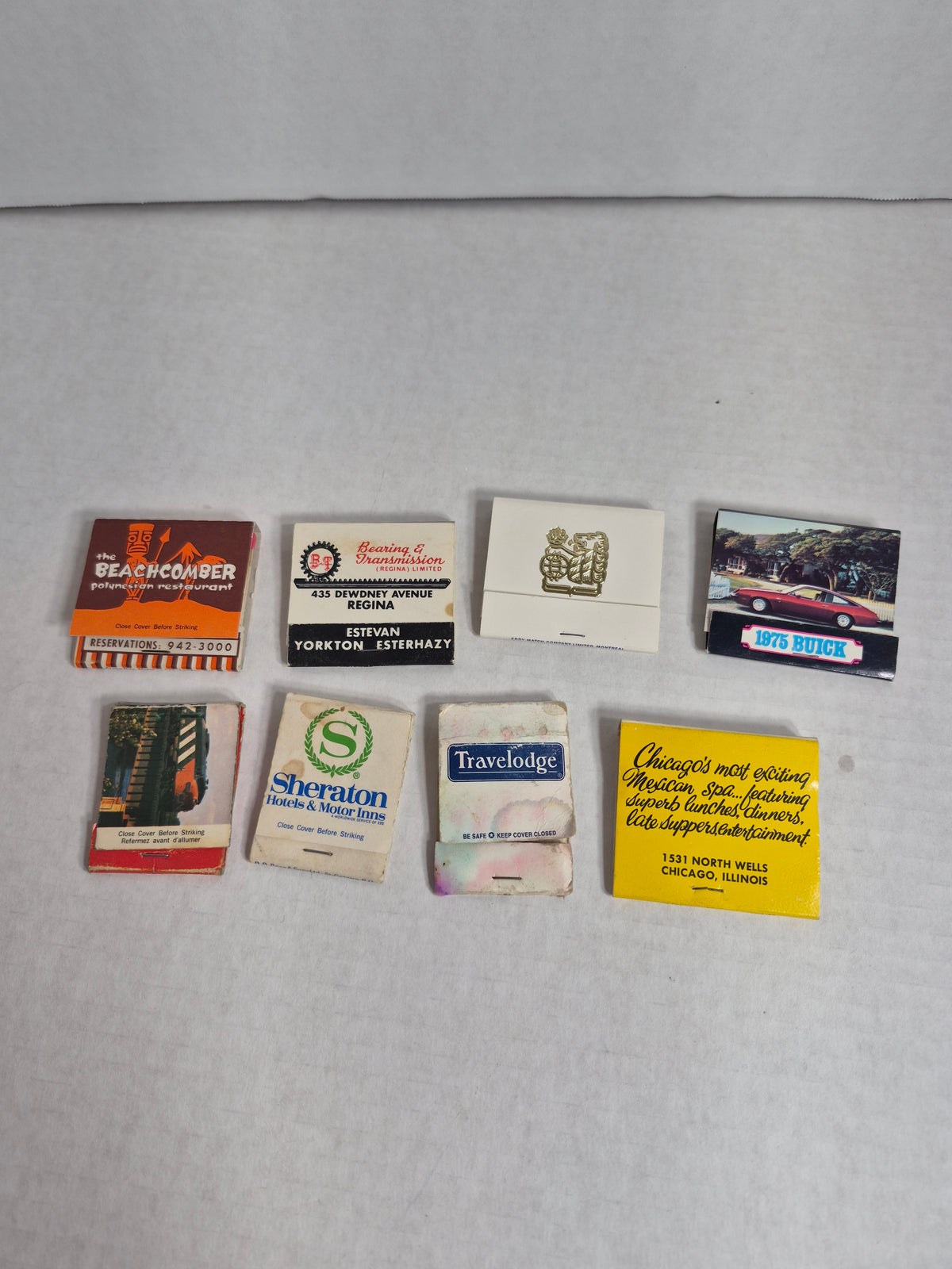 Full Matchbooks Lot of 8 – Sheraton Carlton Winnipeg Beachcomber, Bearing & Transmission Regina, Kelsey Motors Churchill, 1975 Buick, Travelodge
