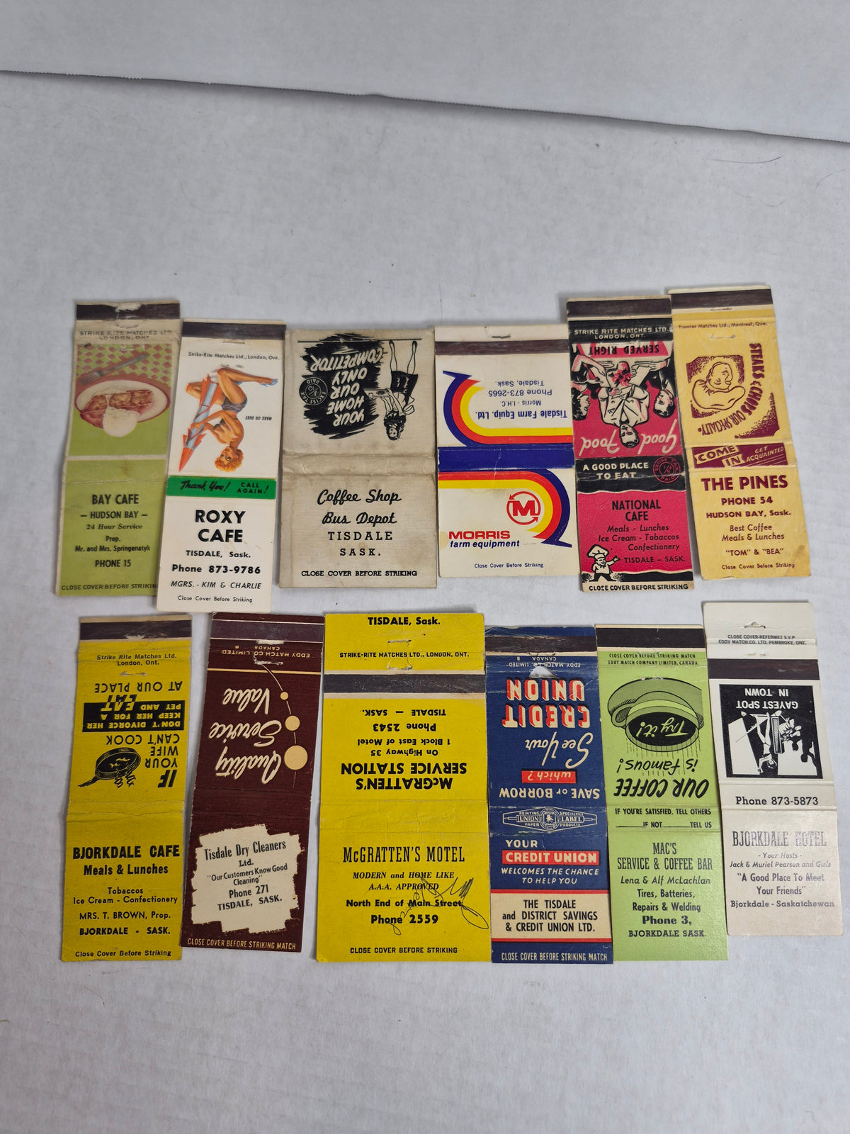 Vintage Matchbook Covers, Lot of 12 – Tisdale, Bjorkdale & Hudson Bay, Saskatchewan: Roxy Cafe Pin-Up, National Cafe, McGratten's Motel, Morris Farm Equipment