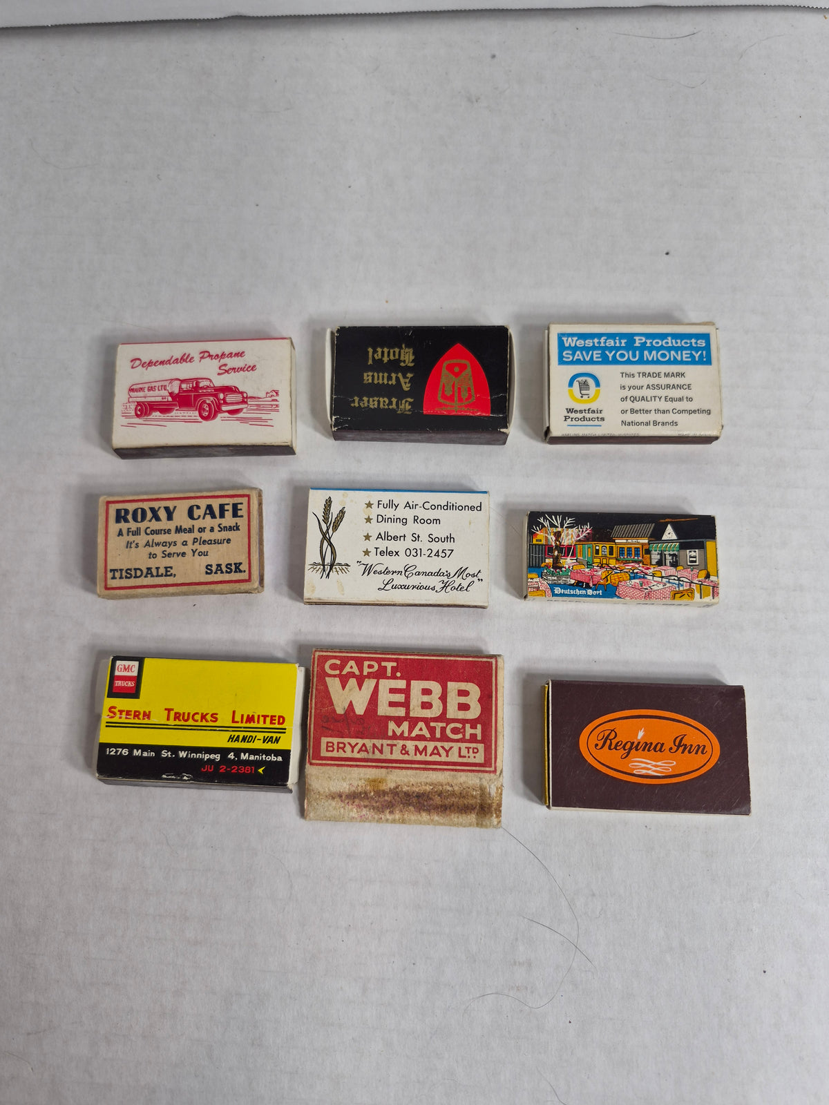 Vintage Advertising Matchboxes, Lot of 9 – Golden West & Regina Inn Regina, Prairie Gas, GMC Stern Trucks Winnipeg, Bryant & May Capt. Webb, Happy Vineyard