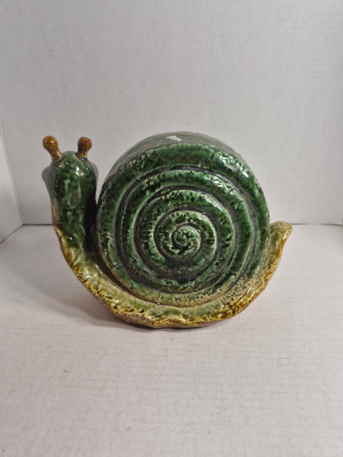 Ceramic Snail Garden Ornament – Mom's Garden Sign – Double-Sided with Spiral Shell – Green and Tan Glaze – 9 x 7 Inches